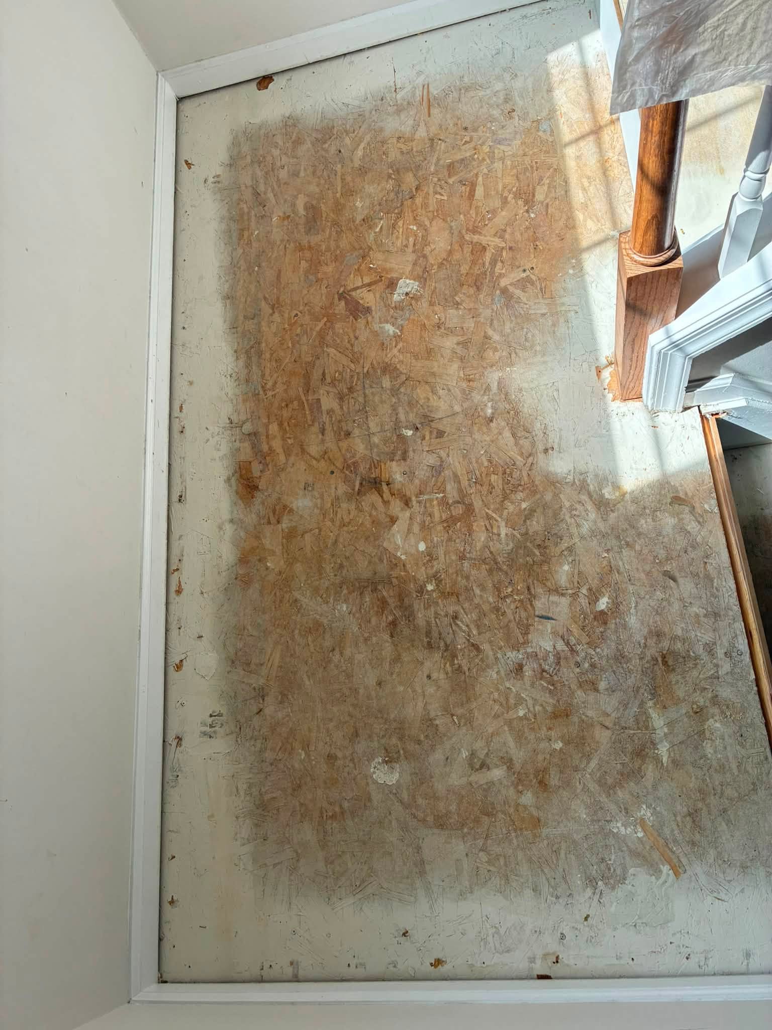 Stair landing underlayment during remodel preparation